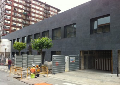 Bush hammered Blue Limestone - facade